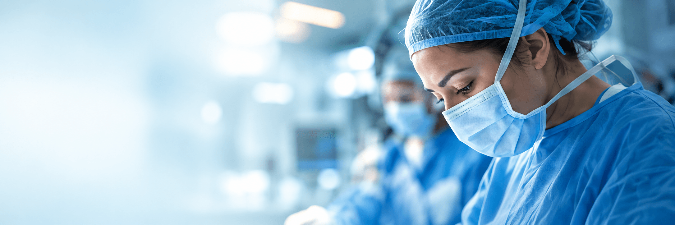 A surgeon working in an operating theatre