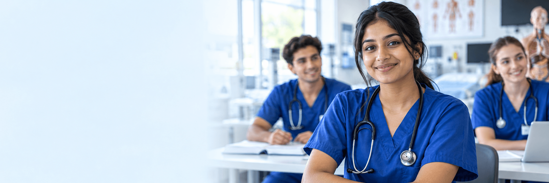 Medical students learning in a clinical setting